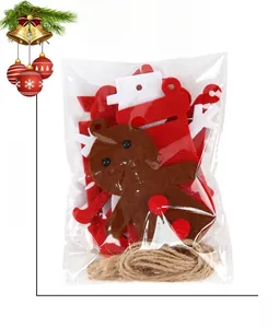 Christmas felt ornaments kit with brown gingerbread man and red charms in pack