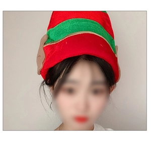 Detail of a Christmas elf hat with red and green stripes and brown ear decorations