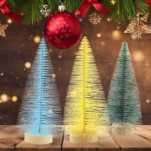 Three colorful mini sisal Christmas trees on wood bases for holiday tabletop decor