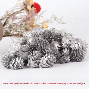 Macro detail of natural silver glitter pine cones for DIY Christmas wreath decoration