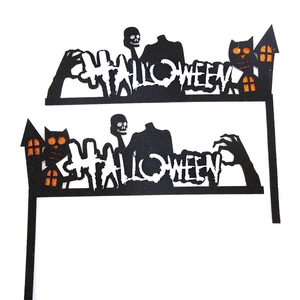 Macro shot of Halloween door corner stickers with black felt and orange glitter accents