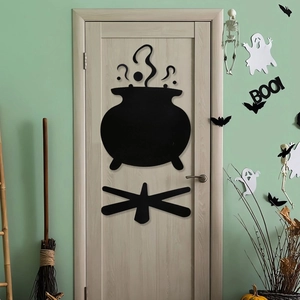 Detailed scene of Halloween felt stickers featuring a cauldron, bats, and BOO lettering