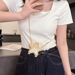 Fashionable star shaped crossbody bag with sparkling rhinestones and gold metal chain