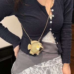 Unique gold goldfish shaped crossbody bag with metallic scales and delicate chain strap