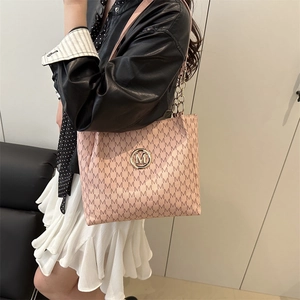 Pink fashion tote bag with all-over M letter print and gold logo for women's spring style