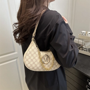 French vintage beige crescent underarm bag with M-letter print and gold chain strap