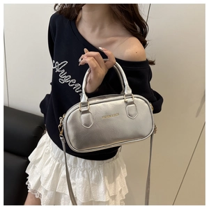 Silver metallic leather shoulder bag with gold logo and long shoulder strap