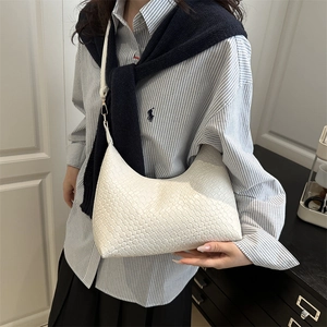 Minimalist woven faux leather crescent tote bag in cream white for daily casual commute