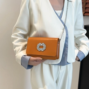 Orange square shoulder bag with sparkling crystal buckle and silver chain strap