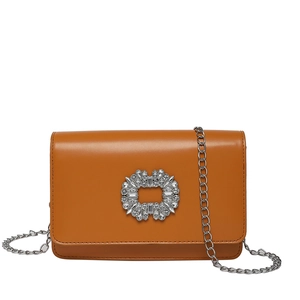 Orange-brown leather shoulder bag with a sparkling rhinestone square buckle and chain