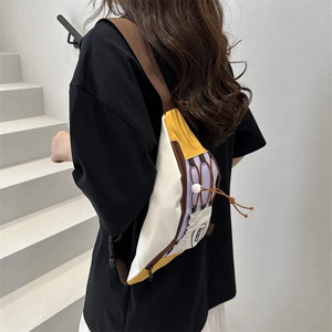 Sac bandoulière moderne blanc jaune et violet avec bandoulière réglable en tissu