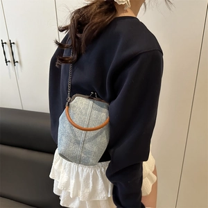 Blue denim bucket bag with sparkling crystals and vintage metal clasp for women