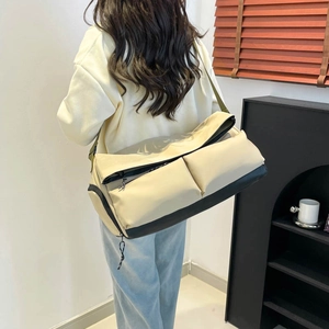 Large capacity shoulder bag with minimalist color block and green strap for casual use