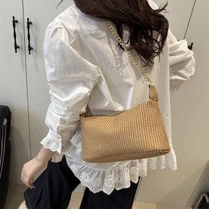 Straw woven pillow shoulder bag with gold chain strap for minimalist summer style