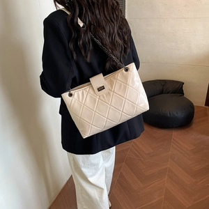 Quilted cream chain shoulder bag for women featuring stylish metal twist lock closure