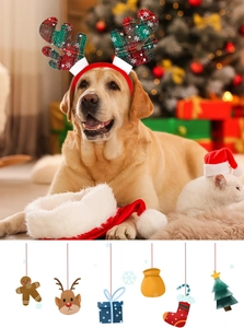 Close-up of festive reindeer antler headband with plaid pattern and white pom poms for dogs