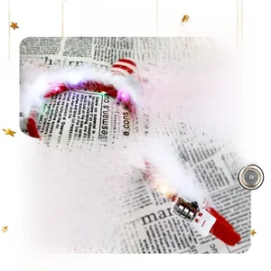 Detail of LED Christmas headband showing feather trim, battery pack, and AG13 button cells