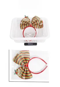 Detailed view of Christmas bow headband dimensions and weight measurement on a scale