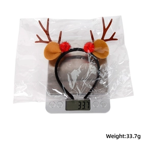 Detailed view of lightweight Christmas reindeer antler headband weighing 33.7 grams