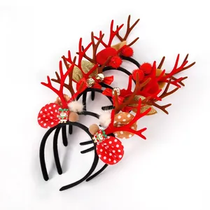 Set of four Christmas reindeer antler headbands with bells, bows, and snowman decorations