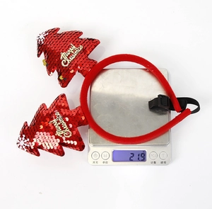 Weight measurement of a Christmas tree headband with red sequins and elastic strap