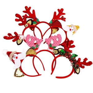 Set of four red Christmas headbands with sequins reindeer antlers and Santa Claus motifs
