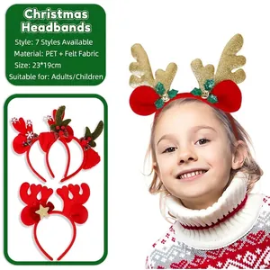 Christmas reindeer antler headband with gold glitter stars and green holly leaf decor