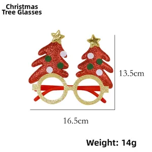 Detailed view of a Christmas tree party glass frame with festive gold and green glitter accents