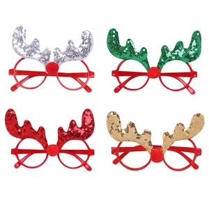 Set of four Christmas reindeer antler glasses frames with sequins and pom-poms for party