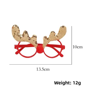 Detailed view of Christmas reindeer glasses showing dimensions 13.5cm width and 10cm height