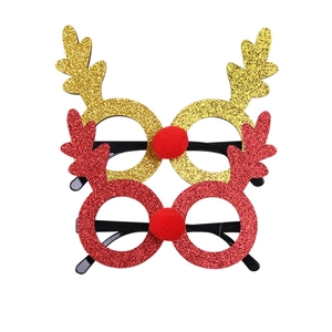 Christmas reindeer glasses set in gold and red glitter with festive red pom pom nose decor