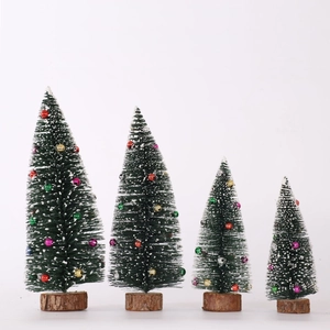 Set of 4 mini flocked Christmas trees with colorful ornaments and natural wood bases