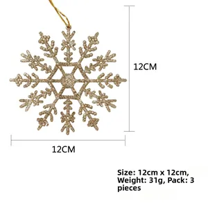 Detailed view of 12cm gold glitter snowflake ornaments with sizing and weight specs