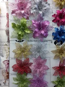 Close-up of glitter hollowed Christmas flower decorations in various vibrant colors