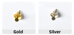 Detailed comparison of 1cm mini gold and silver metal Christmas bells with hanging loops