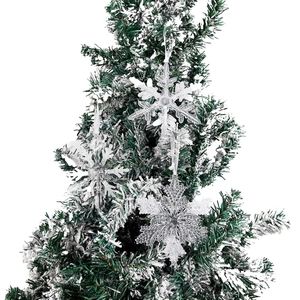 Clear acrylic Christmas snowflake ornaments with glitter hanging on a snow-dusted tree