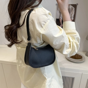 Minimalist black lychee texture half-moon underarm bag with gold zipper for women