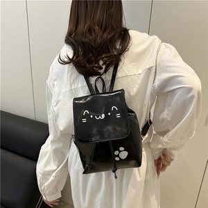 Minimalist black patent leather mini backpack with cute cat patterns for women in casual style
