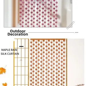 Detail of maple leaf foil fringe curtains in purple and orange for party backdrops