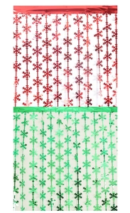 Detail of red and green snowflake tassel foil curtains for festive party background decor