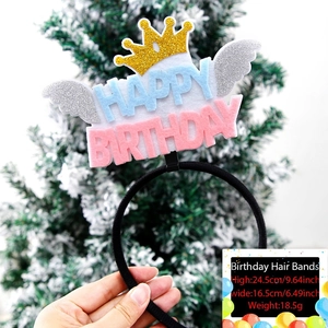 Detail of Happy Birthday headband with gold glitter crown and silver felt feathers