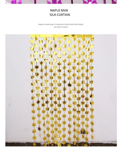 Close-up of golden maple leaf tinsel curtain with durable electroplated iron texture