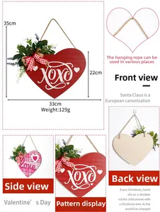Détail d'une plaque cœur en bois de Saint-Valentin avec texte XOXO et nœud à carreaux