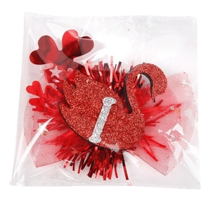 Sparkly red swan hair clip with mesh and heart sequins for Valentine's Day party
