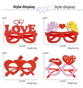Detailed view of four Valentine glitter party glasses with LOVE and heart designs