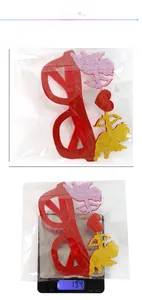 Red glitter Valentine's Day glasses with Cupid design, measuring 17cm by 16cm in size