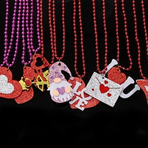 Valentine's beaded necklaces with glitter hearts, love letters, and gnome pendants