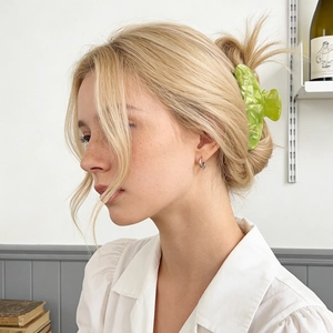 Large mint green marble acetate hair claw clip for elegant updo hairstyles
