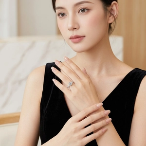 Elegant S925 sterling silver moissanite ring featuring a sparkling round center stone