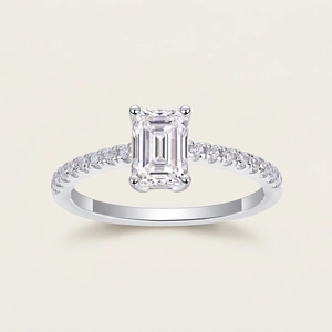 Elegant S925 sterling silver ring with emerald cut moissanite and wavy feather-like band